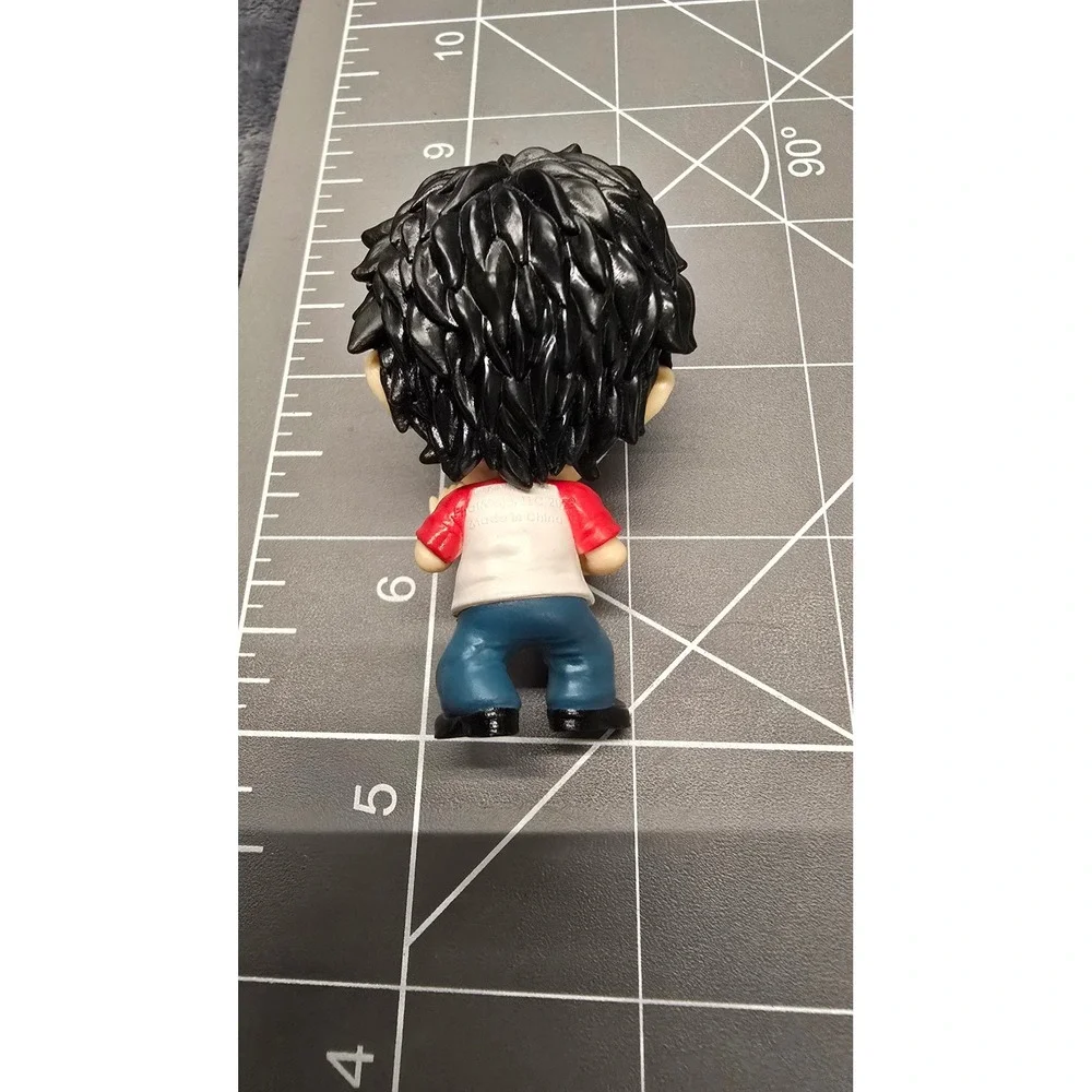 Mini-figure of Takemichi Hanagaki from the popular anime series Tokyo Revengers